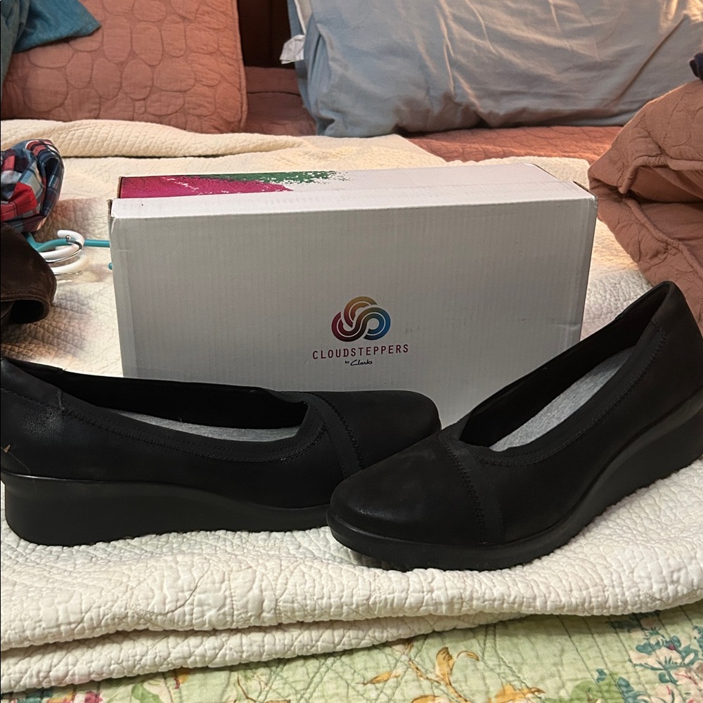 Cloudsteppers by Clarks 
Black Slip-On Comfort Wedges
BRAND NEW
